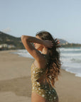 Modest one-piece swimsuit with open back and tying straps