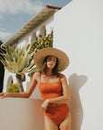 Dark orange two-piece ginger swimsuit for women