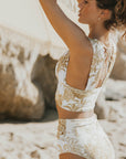 white and gold tropical high-waisted bikini bottoms