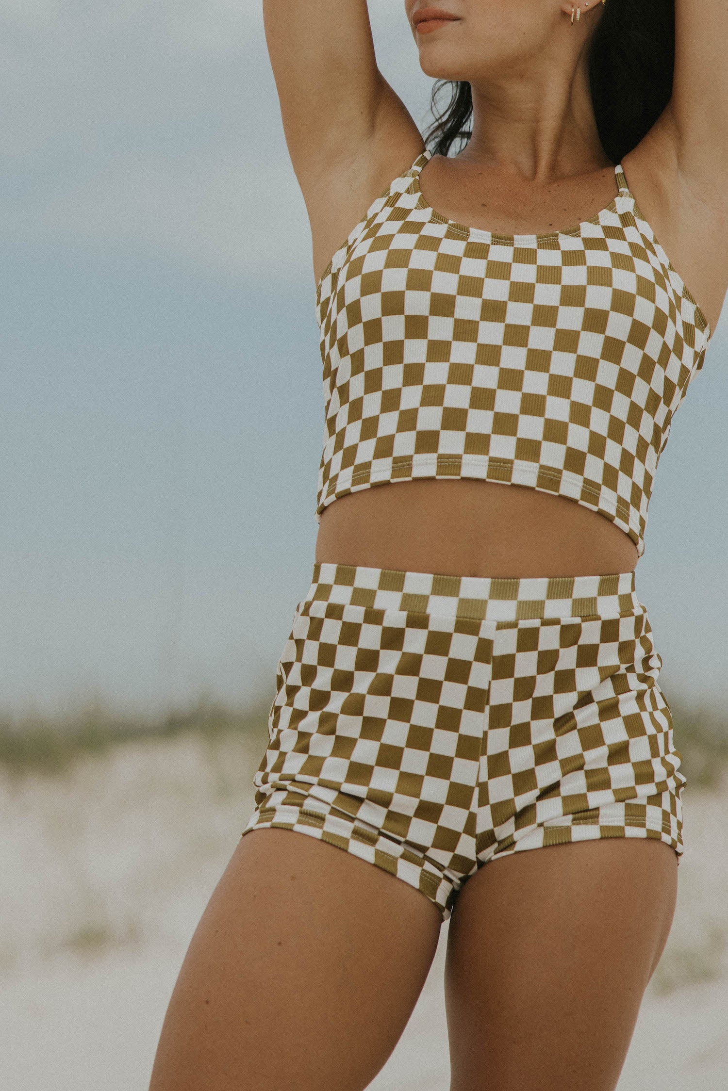 trendy checkered olive green and white swim shorts for women modest comfortable