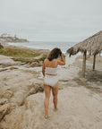 Full coverage gingham bikini top with adjustable ruching sides. 