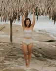 Full coverage gingham bikini top with adjustable ruching sides. 