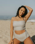 Full coverage gingham bikini top with adjustable ruching sides.